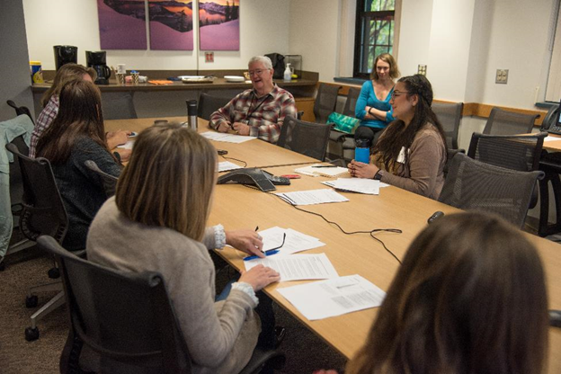 The Veteran Engagement Group discussing research.