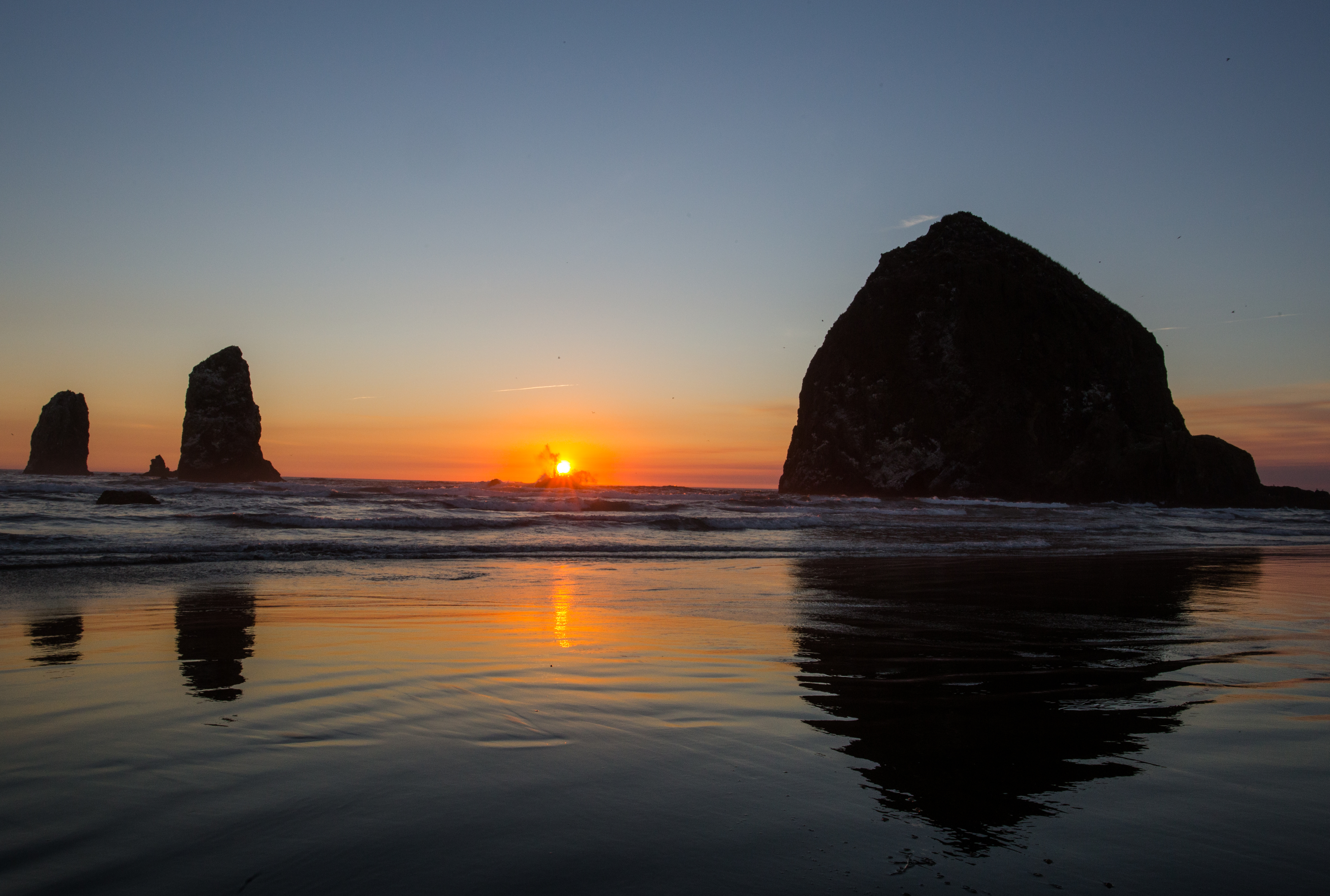 Photo of the ocean at sunset.